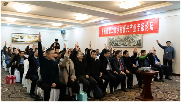 大会与会人员一致举手通过了以上两个报告